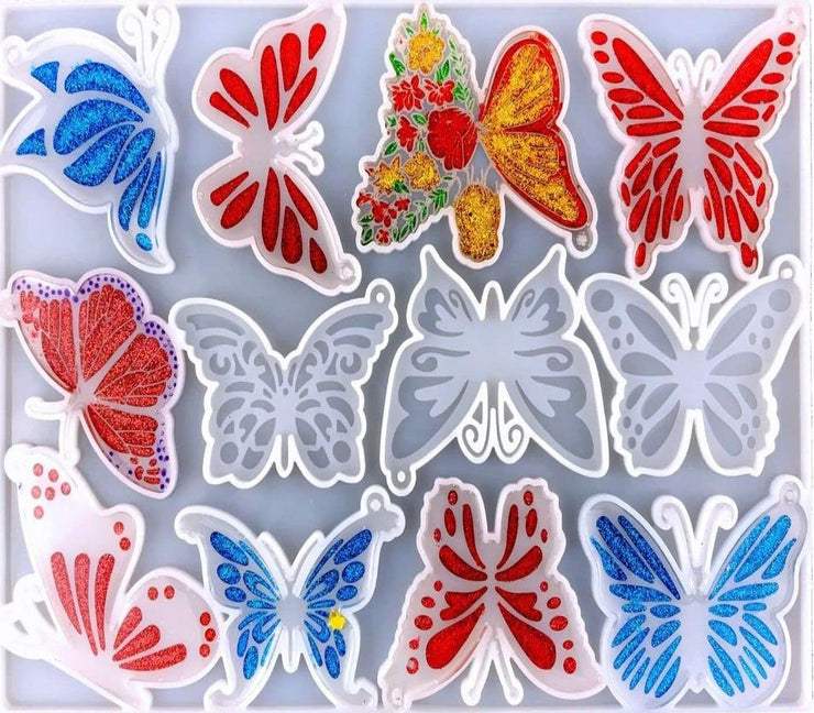 الب سيليكون ابيض مستورد (12) شكل مختلف من الفراشات  يستخدم فى اعمال الريزن و الهاند ميد